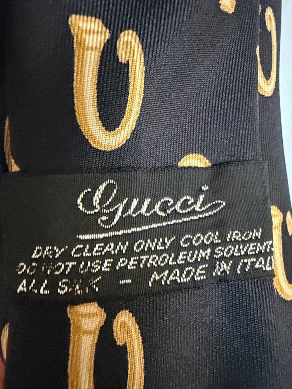 Gucci Black Silk Tie with Gold Horseshoe Motif